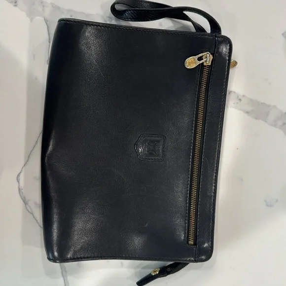 Celine clutch with wrist strap 8x11 in very good used condition